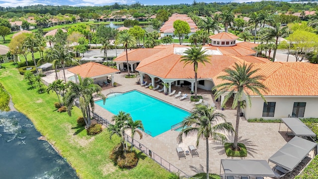 14841 Strand Ln (), Unit Delray Beach, FL 33446 - community pool featuring a water view, a residential view, and a patio