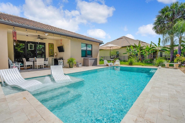 4884 SW Gossamer Cir, Palm City, FL 34990 - view of swimming pool with a patio area and ceiling fan