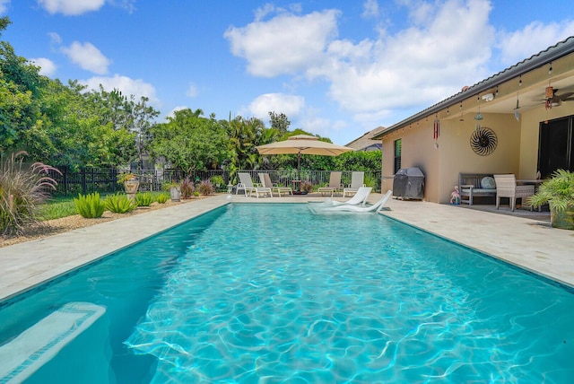 4884 SW Gossamer Cir, Palm City, FL 34990 - view of swimming pool with a patio area and a ceiling fan