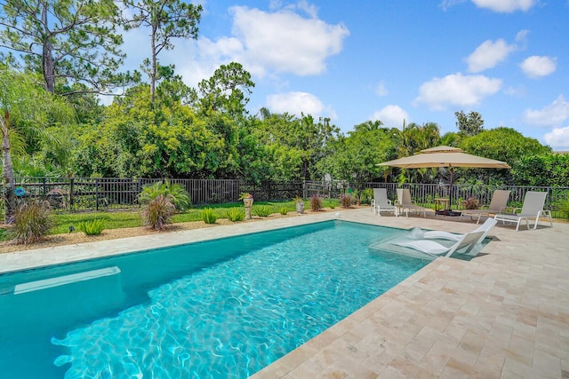 4884 SW Gossamer Cir, Palm City, FL 34990 - view of pool featuring a patio area