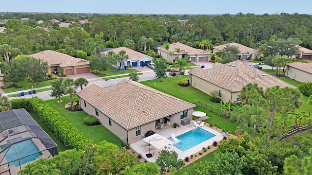 4884 SW Gossamer Cir, Palm City, FL 34990 - aerial perspective of suburban area with a pool