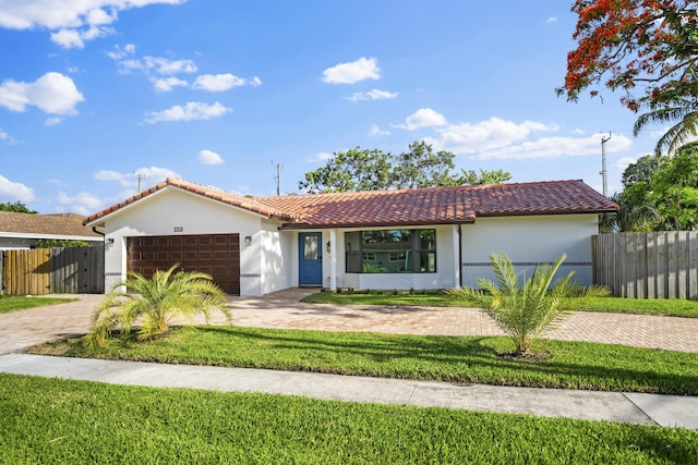 1318 NW 4th St, Boca Raton, FL 33486 - mediterranean / spanish house featuring a tile roof, a garage, stucco siding, and driveway