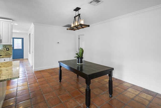 1318 NW 4th St, Boca Raton, FL 33486 - dining area featuring ornamental molding, dark tile patterned floors, and recessed lighting