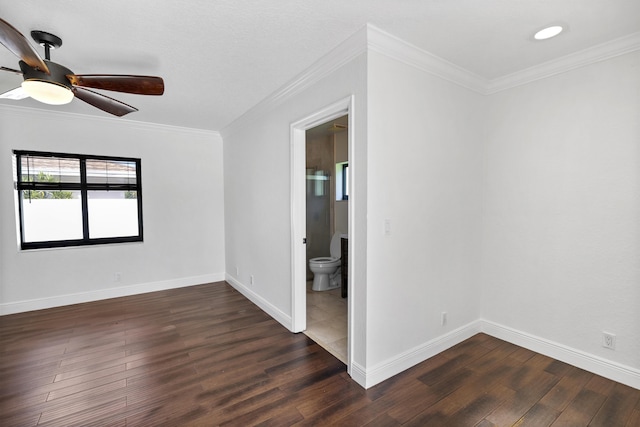 1318 NW 4th St, Boca Raton, FL 33486 - spare room with dark wood-type flooring, ceiling fan, and crown molding