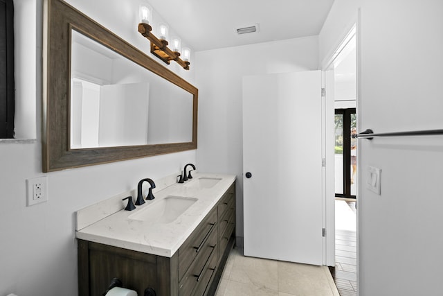1318 NW 4th St, Boca Raton, FL 33486 - bathroom with double vanity and tile patterned flooring