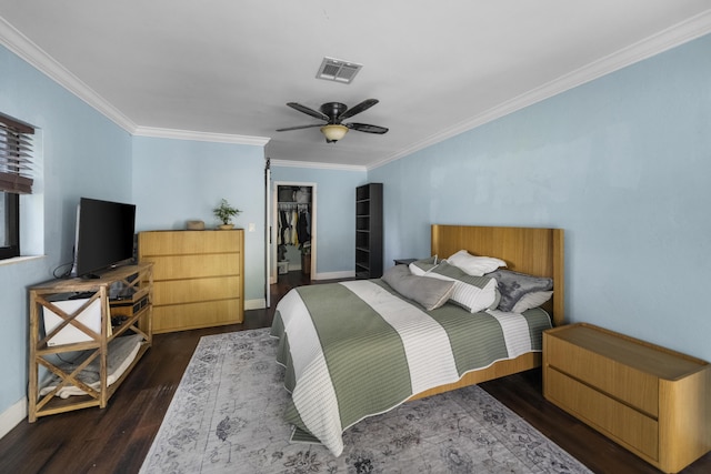 1318 NW 4th St, Boca Raton, FL 33486 - bedroom with wood finished floors, ornamental molding, a spacious closet, a closet, and a ceiling fan