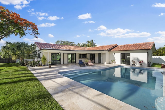1318 NW 4th St, Boca Raton, FL 33486 - rear view of house with a patio area, a tile roof, and stucco siding