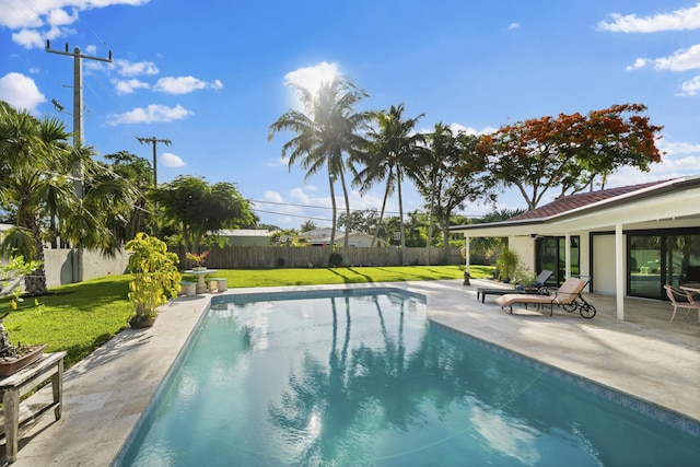 1318 NW 4th St, Boca Raton, FL 33486 - view of pool featuring a patio and a fenced backyard
