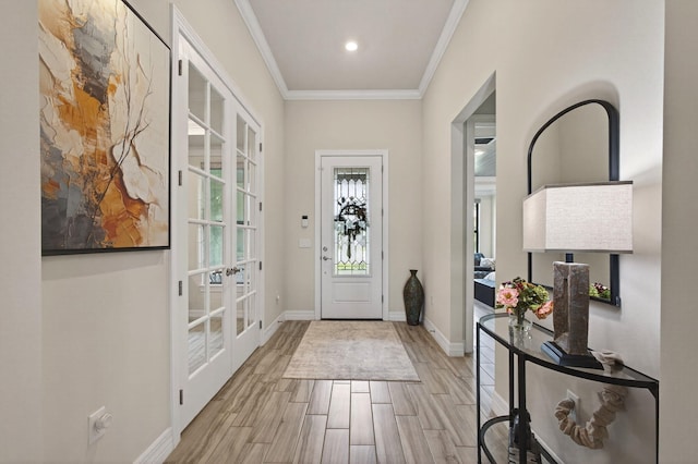 11620 Sally Ann Dr, Palm Beach Gardens, FL 33412 - foyer featuring ornamental molding, wood finished floors, baseboards, french doors, and recessed lighting
