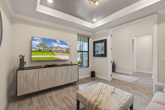 11620 Sally Ann Dr, Palm Beach Gardens, FL 33412 - living area featuring a raised ceiling, light wood-style floors, crown molding, baseboards, and recessed lighting