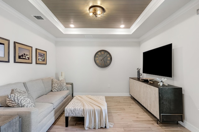 11620 Sally Ann Dr, Palm Beach Gardens, FL 33412 - living room featuring a tray ceiling, light wood finished floors, baseboards, and crown molding