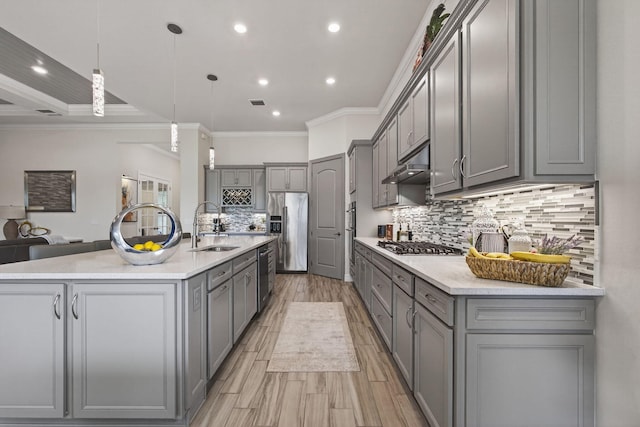 11620 Sally Ann Dr, Palm Beach Gardens, FL 33412 - kitchen with gray cabinetry, stainless steel appliances, a sink, recessed lighting, and ornamental molding