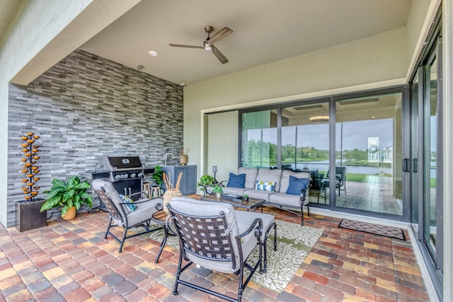11620 Sally Ann Dr, Palm Beach Gardens, FL 33412 - view of patio with an outdoor hangout area, ceiling fan, a grill, and a water view