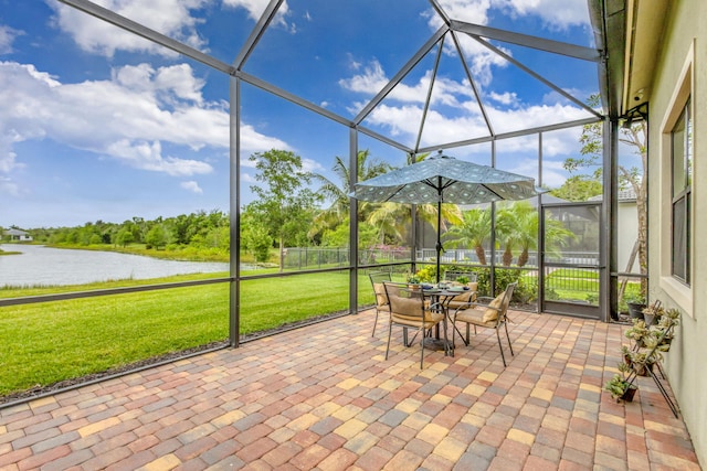 11620 Sally Ann Dr, Palm Beach Gardens, FL 33412 - sunroom / solarium featuring a water view and outdoor dining space
