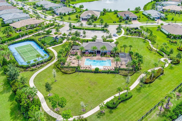 11620 Sally Ann Dr, Palm Beach Gardens, FL 33412 - drone / aerial view of a pool area and a large body of water