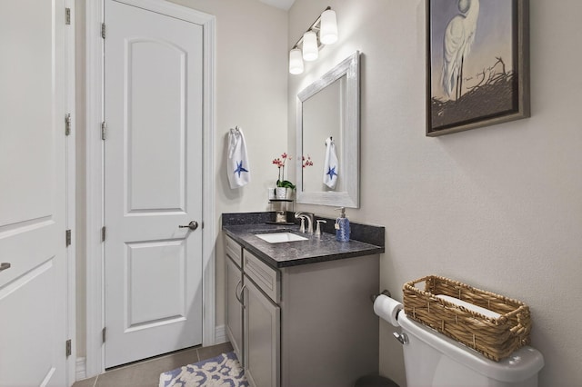 11620 Sally Ann Dr, Palm Beach Gardens, FL 33412 - bathroom with vanity, toilet, and tile patterned flooring