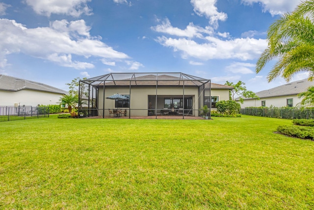 11620 Sally Ann Dr, Palm Beach Gardens, FL 33412 - back of property featuring a lanai, stucco siding, and a patio