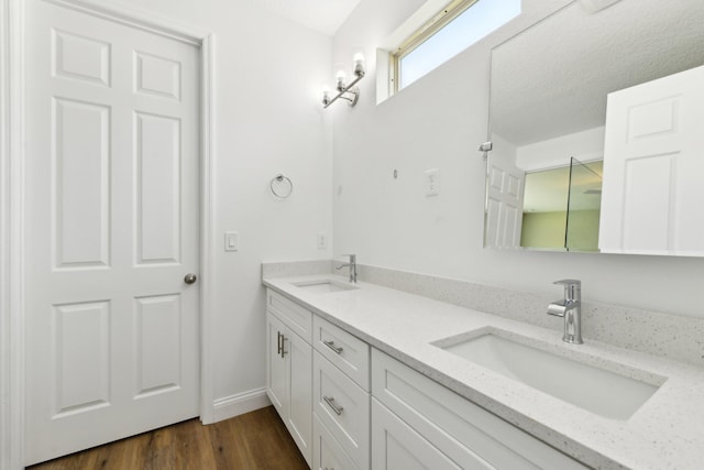 518 Scodella St SW, Palm Bay, FL 32908 - full bath featuring double vanity and wood finished floors