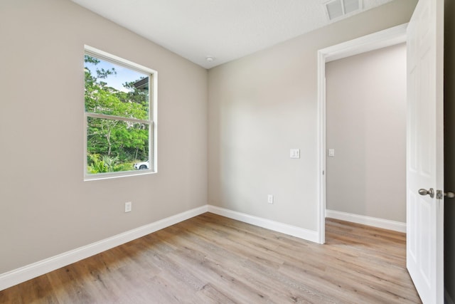 518 Scodella St SW, Palm Bay, FL 32908 - unfurnished room featuring light wood-type flooring and baseboards