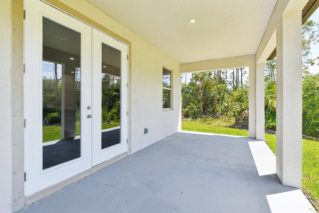518 Scodella St SW, Palm Bay, FL 32908 - view of patio featuring french doors