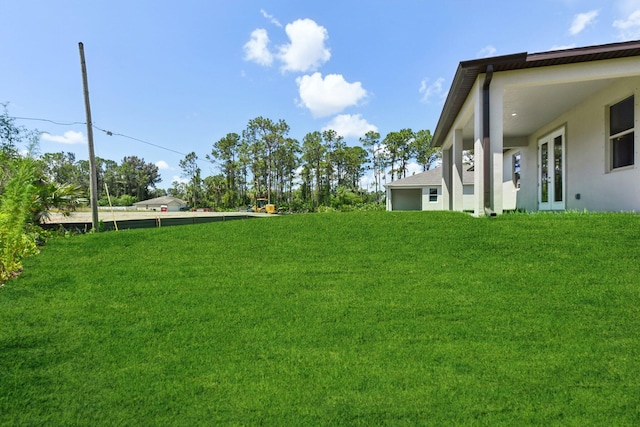 518 Scodella St SW, Palm Bay, FL 32908 - view of grassy yard featuring french doors