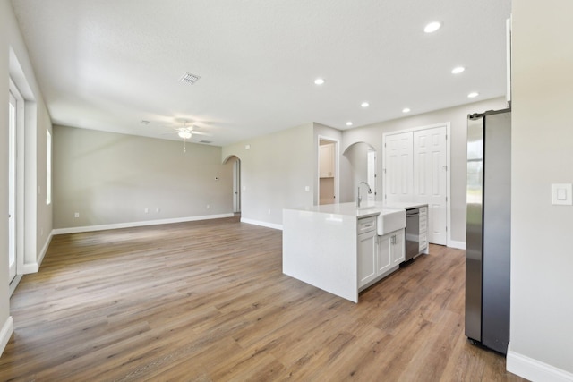 518 Scodella St SW, Palm Bay, FL 32908 - kitchen featuring a sink, arched walkways, stainless steel appliances, ceiling fan, and recessed lighting