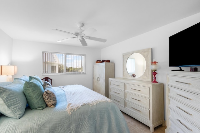 7 Colonial Club Dr Unit 300, Boynton Beach, FL 33435 - bedroom featuring ceiling fan and light tile patterned floors
