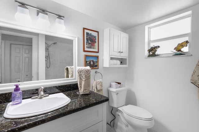 7 Colonial Club Dr Unit 300, Boynton Beach, FL 33435 - bathroom with vanity, toilet, and a shower