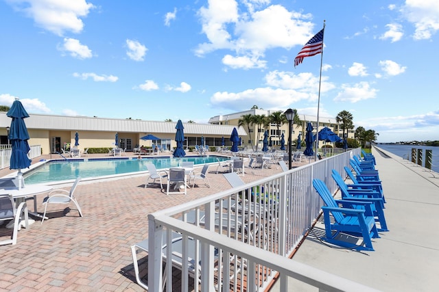 7 Colonial Club Dr Unit 300, Boynton Beach, FL 33435 - community pool with a patio area