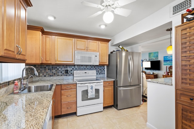 7 Colonial Club Dr Unit 300, Boynton Beach, FL 33435 - kitchen featuring white appliances, a sink, light tile patterned floors, tasteful backsplash, and ceiling fan