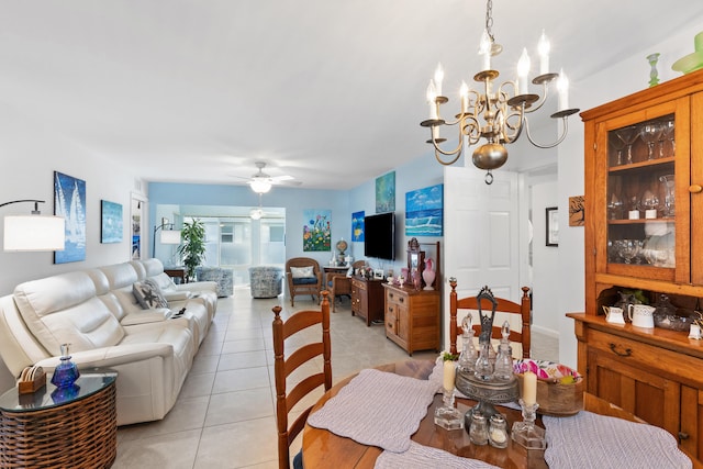 7 Colonial Club Dr Unit 300, Boynton Beach, FL 33435 - dining space featuring light tile patterned flooring, a chandelier, and ceiling fan