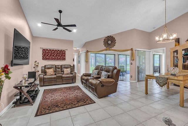 5830 Parkwalk Cir W, Boynton Beach, FL 33472 - living room featuring a chandelier, ceiling fan, high vaulted ceiling, light tile patterned flooring, and baseboards
