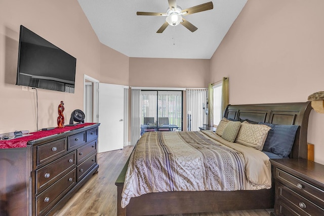 5830 Parkwalk Cir W, Boynton Beach, FL 33472 - bedroom with access to outside, wood finished floors, high vaulted ceiling, and ceiling fan