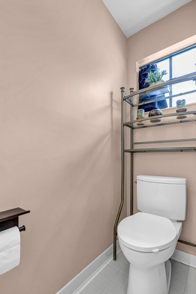 5830 Parkwalk Cir W, Boynton Beach, FL 33472 - bathroom featuring toilet, baseboards, and tile patterned flooring