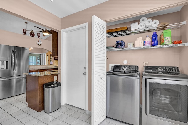 5830 Parkwalk Cir W, Boynton Beach, FL 33472 - laundry room featuring independent washer and dryer and light tile patterned floors