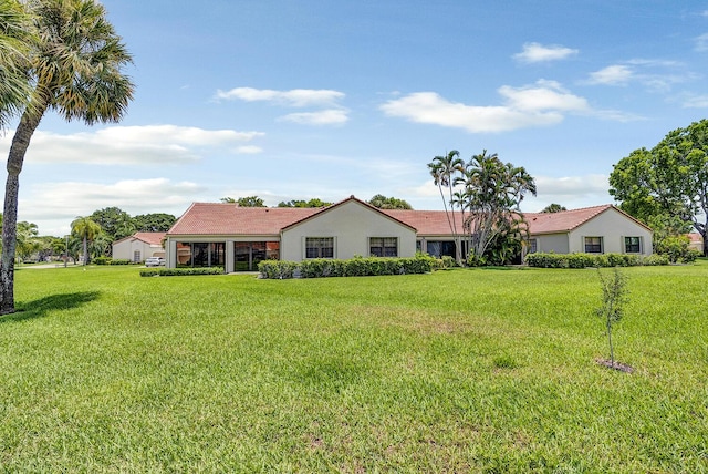 5830 Parkwalk Cir W, Boynton Beach, FL 33472 - view of front facade with a front yard and stucco siding