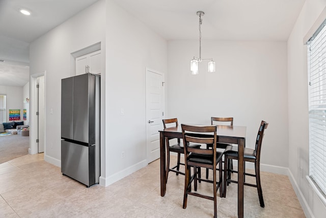 5309 Vespera St, Fort Pierce, FL 34951 - dining area with light tile patterned floors and baseboards
