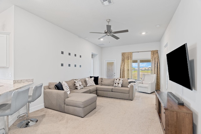 5309 Vespera St, Fort Pierce, FL 34951 - living area with light colored carpet, a ceiling fan, and recessed lighting
