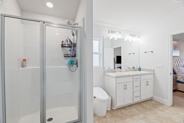 5309 Vespera St, Fort Pierce, FL 34951 - bathroom featuring double vanity, ensuite bathroom, a stall shower, and toilet