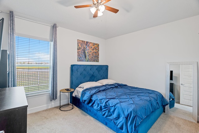 5309 Vespera St, Fort Pierce, FL 34951 - carpeted bedroom featuring ceiling fan and baseboards