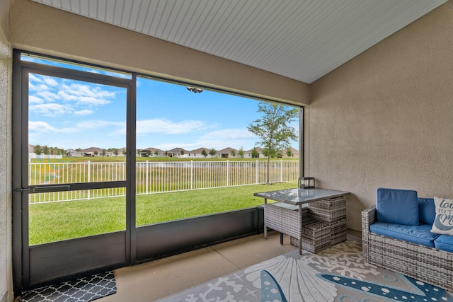 5309 Vespera St, Fort Pierce, FL 34951 - sunroom with a residential view and vaulted ceiling