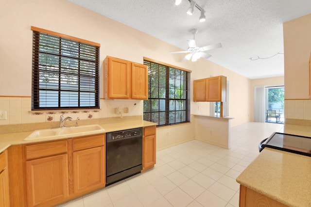 4560 Sherwood Forest Dr, Delray Beach, FL 33445 - kitchen featuring black appliances, a sink, ceiling fan, light countertops, and light tile patterned floors