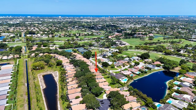 4560 Sherwood Forest Dr, Delray Beach, FL 33445 - aerial overview of property's location featuring a nearby body of water, nearby suburban area, and a local golf course