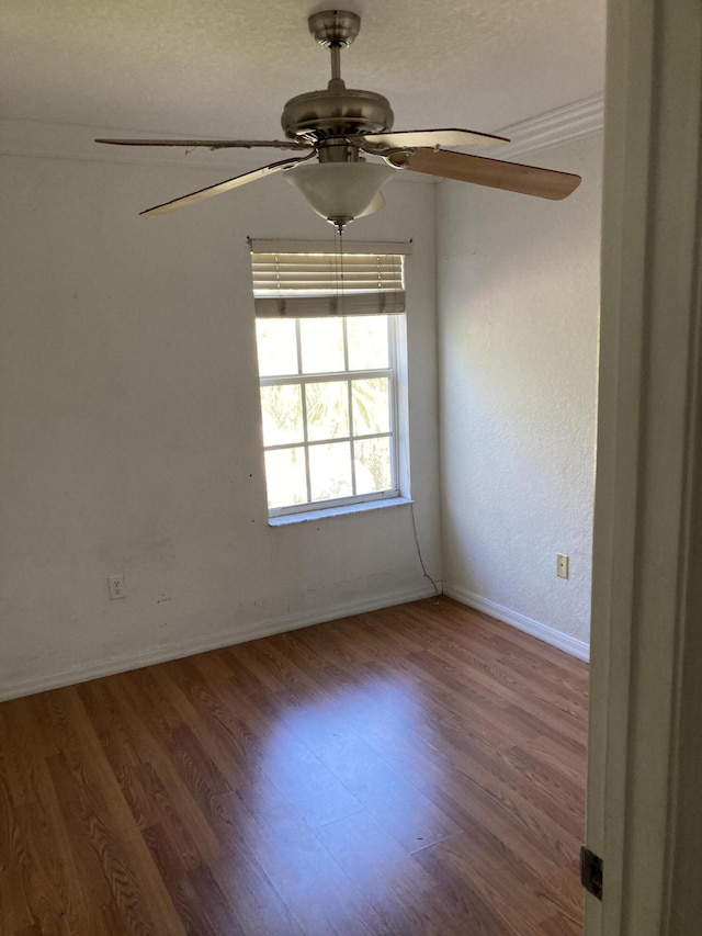 1098 Winding Rose Way, West Palm Beach, FL 33415 - spare room featuring ceiling fan, baseboards, and wood finished floors