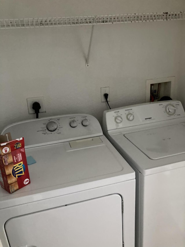 1098 Winding Rose Way, West Palm Beach, FL 33415 - washroom with washer and clothes dryer