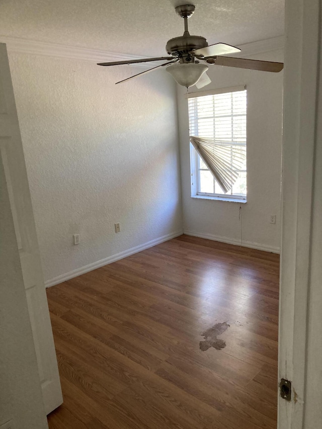 1098 Winding Rose Way, West Palm Beach, FL 33415 - unfurnished room with wood finished floors, baseboards, and ceiling fan