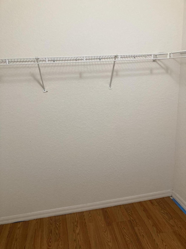 1098 Winding Rose Way, West Palm Beach, FL 33415 - spacious closet with wood finished floors