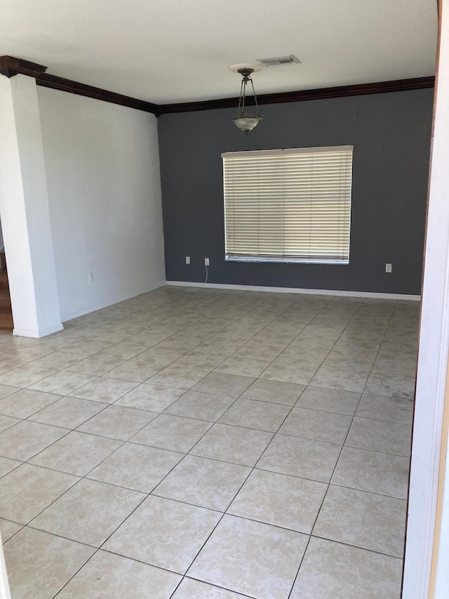 1098 Winding Rose Way, West Palm Beach, FL 33415 - unfurnished room with crown molding, light tile patterned flooring, and baseboards