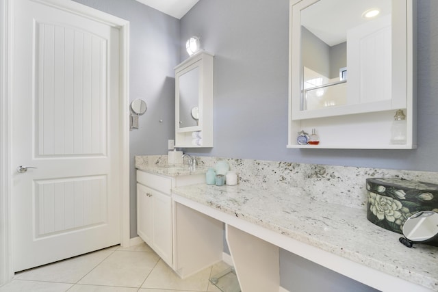 568 SE Monet Dr, Port Saint Lucie, FL 34984 - full bathroom with vanity, tile patterned floors, and a shower