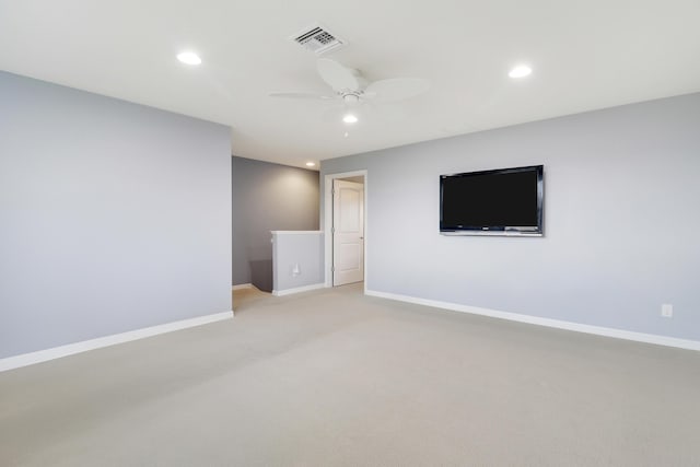 568 SE Monet Dr, Port Saint Lucie, FL 34984 - unfurnished room with recessed lighting, a ceiling fan, light colored carpet, and baseboards